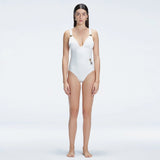 Marina White V Neck Swimsuit | Moeva | Swimsuit | Each week unveils new pieces—luxury swimwear, fluid resort silhouettes, and elevated summer-to-evening essentials designed to carry you from coastal escapes to city nights.