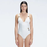 Marina White V Neck Swimsuit | Moeva | Swimsuit | Each week unveils new pieces—luxury swimwear, fluid resort silhouettes, and elevated summer-to-evening essentials designed to carry you from coastal escapes to city nights.