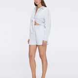 Hanson White Long Sleeve Linen Tie Front Shirt | Moeva | Shirt | Each week unveils new pieces—luxury swimwear, fluid resort silhouettes, and elevated summer-to-evening essentials designed to carry you from coastal escapes to city nights.