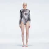 Mireya Black Optical Long Sleeve Bodysuit | Moeva | One-Piece | Each week unveils new pieces—luxury swimwear, fluid resort silhouettes, and elevated summer-to-evening essentials designed to carry you from coastal escapes to city nights.