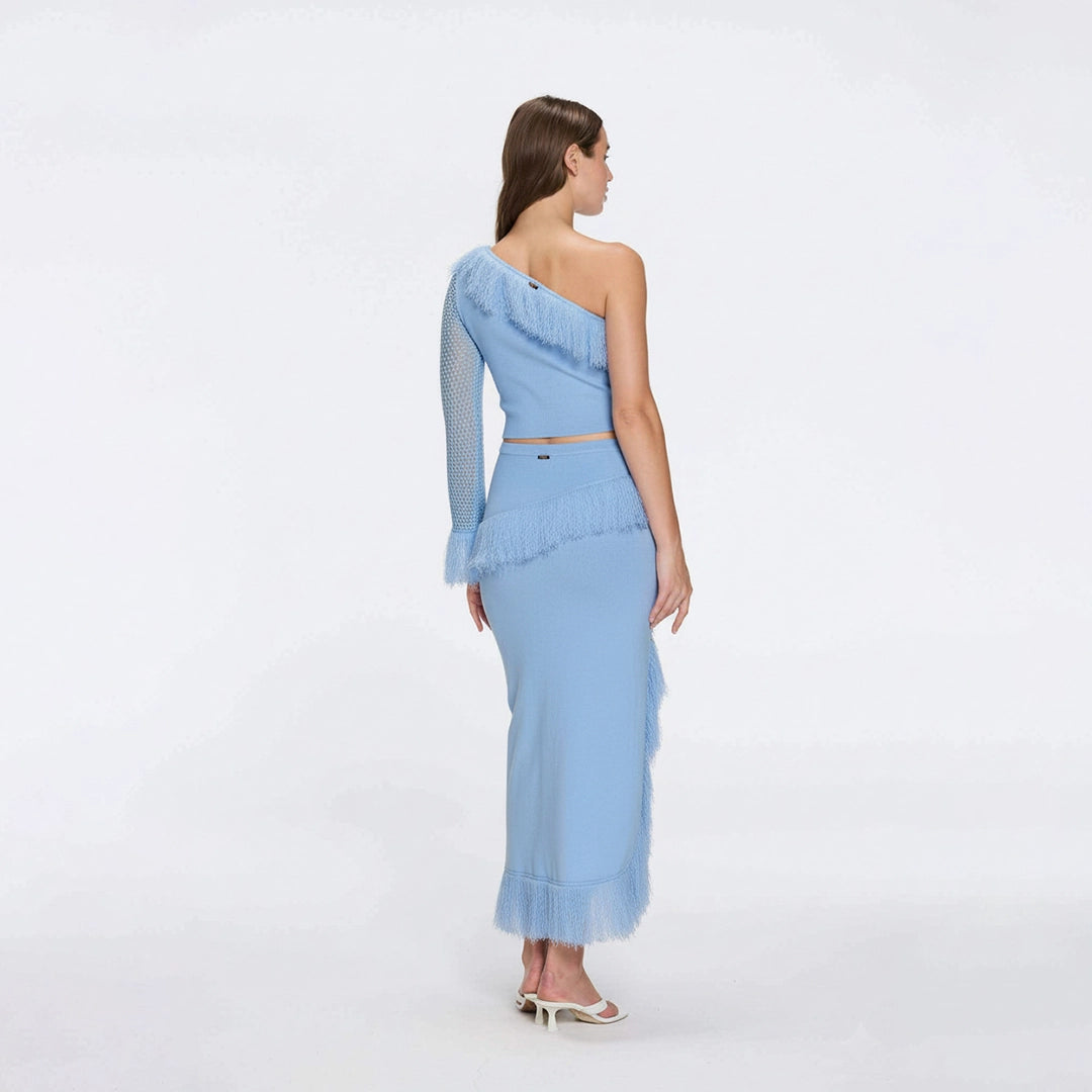 Alani Blue Fringe Detail Asymmetric Slit Midi Skirt | Moeva | Skirt | Each week unveils new pieces—luxury swimwear, fluid resort silhouettes, and elevated summer-to-evening essentials designed to carry you from coastal escapes to city nights.