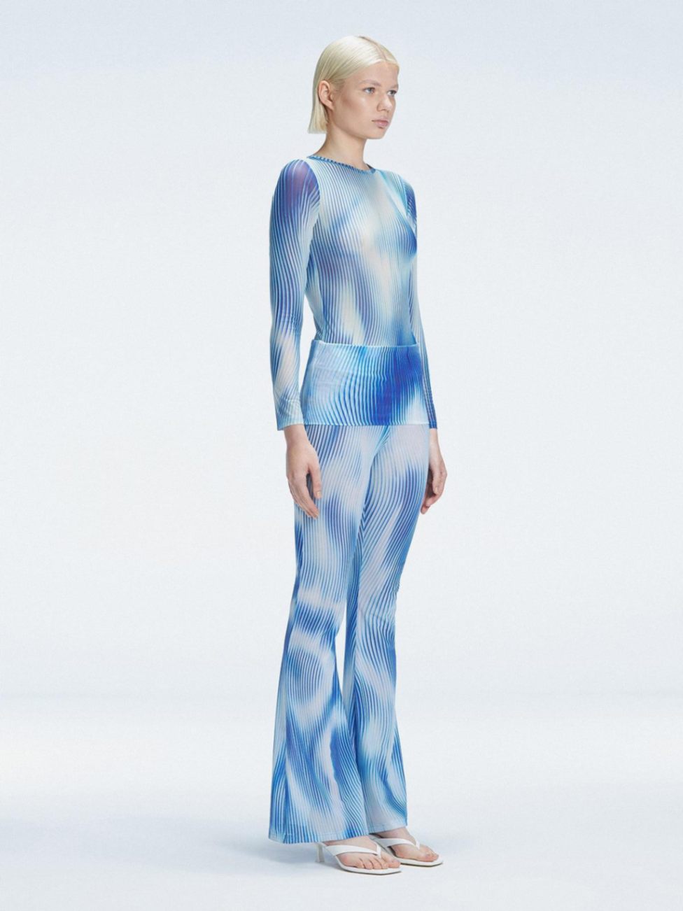Mireya Bodysuit and Freya High Waist Pants Blue Optical Set | Moeva | Women Beachwear Pants | Each week unveils new pieces—luxury swimwear, fluid resort silhouettes, and elevated summer-to-evening essentials designed to carry you from coastal escapes to city nights.