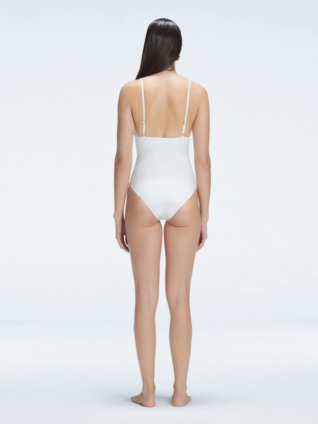 Marina White V Neck Swimsuit | Moeva | One-Piece | Each week unveils new pieces—luxury swimwear, fluid resort silhouettes, and elevated summer-to-evening essentials designed to carry you from coastal escapes to city nights.