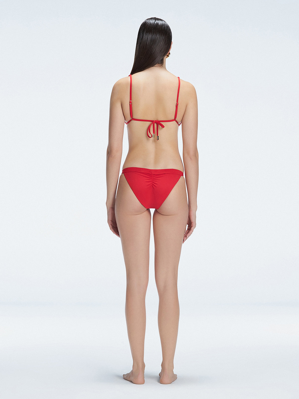 Zella Red Mid Coverage Solid Bikini Bottom | Moeva | Bikini Bottom | Each week unveils new pieces—luxury swimwear, fluid resort silhouettes, and elevated summer-to-evening essentials designed to carry you from coastal escapes to city nights.