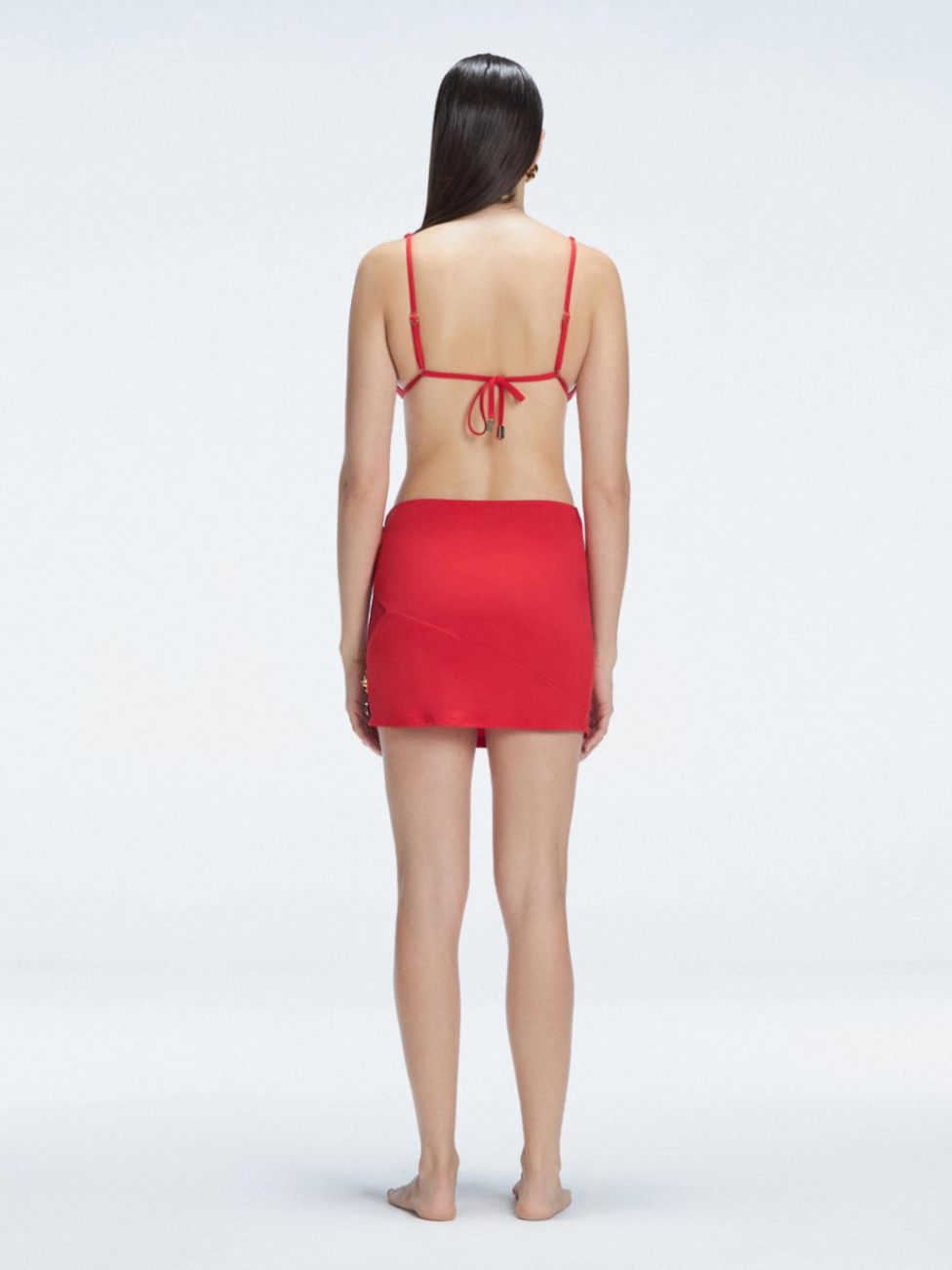 Siena Red Mesh Detail Mini Skirt | Moeva | Beachwear Skirts | Each week unveils new pieces—luxury swimwear, fluid resort silhouettes, and elevated summer-to-evening essentials designed to carry you from coastal escapes to city nights.
