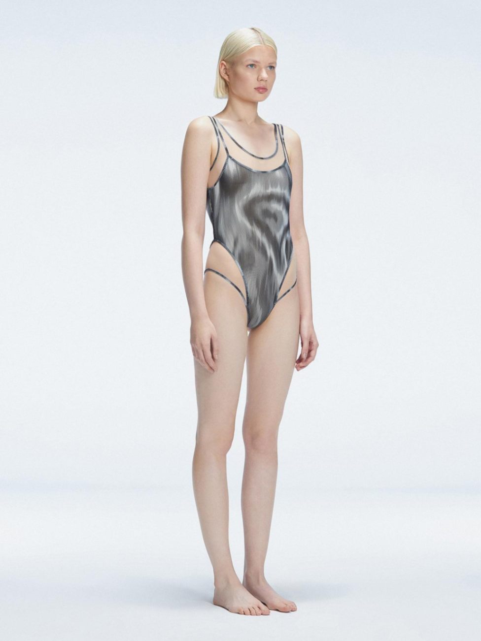 Calista Black Plunge Scoop Neck Swimsuit | Moeva | One-Piece | Each week unveils new pieces—luxury swimwear, fluid resort silhouettes, and elevated summer-to-evening essentials designed to carry you from coastal escapes to city nights.