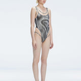 Calista Black Plunge Scoop Neck Swimsuit | Moeva | One-Piece | Each week unveils new pieces—luxury swimwear, fluid resort silhouettes, and elevated summer-to-evening essentials designed to carry you from coastal escapes to city nights.