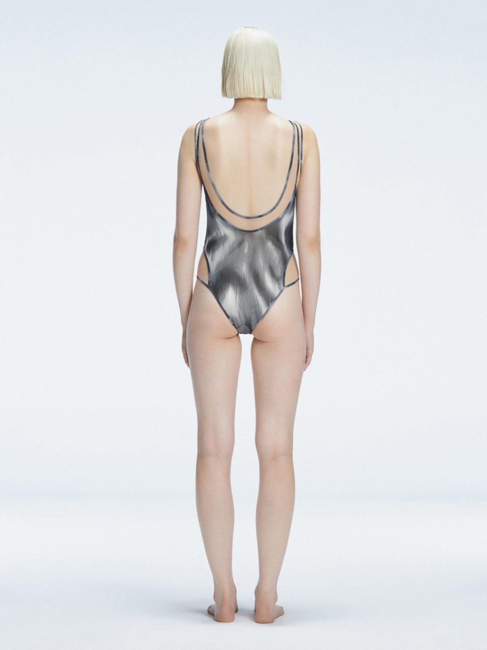Calista Black Plunge Scoop Neck Swimsuit | Moeva | One-Piece | Each week unveils new pieces—luxury swimwear, fluid resort silhouettes, and elevated summer-to-evening essentials designed to carry you from coastal escapes to city nights.