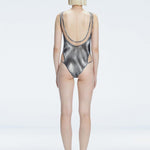 Calista Black Plunge Scoop Neck Swimsuit | Moeva | Swimsuit | Each week unveils new pieces—luxury swimwear, fluid resort silhouettes, and elevated summer-to-evening essentials designed to carry you from coastal escapes to city nights.