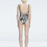 Calista Black Plunge Scoop Neck Swimsuit | Moeva | One-Piece | Each week unveils new pieces—luxury swimwear, fluid resort silhouettes, and elevated summer-to-evening essentials designed to carry you from coastal escapes to city nights.
