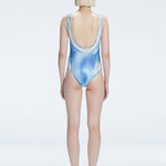 Calista Blue Plunge Scoop Neck Swimsuit | Moeva | Swimsuit | Each week unveils new pieces—luxury swimwear, fluid resort silhouettes, and elevated summer-to-evening essentials designed to carry you from coastal escapes to city nights.