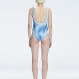 Calista Blue Plunge Scoop Neck Swimsuit | Moeva | One-Piece | Each week unveils new pieces—luxury swimwear, fluid resort silhouettes, and elevated summer-to-evening essentials designed to carry you from coastal escapes to city nights.