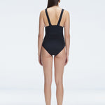Griselda Black V-Neck Ruched Swimdress with Gold Detail | Moeva | Swimsuit | Each week unveils new pieces—luxury swimwear, fluid resort silhouettes, and elevated summer-to-evening essentials designed to carry you from coastal escapes to city nights.