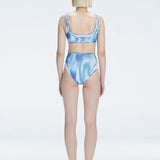 Rosalind Blue Optical Scoop Neck 3D Print Bikini Top | Moeva | Bikini Top | Each week unveils new pieces—luxury swimwear, fluid resort silhouettes, and elevated summer-to-evening essentials designed to carry you from coastal escapes to city nights.