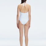 Miley White Halter Swimsuit | Moeva | Swimsuit | Each week unveils new pieces—luxury swimwear, fluid resort silhouettes, and elevated summer-to-evening essentials designed to carry you from coastal escapes to city nights.
