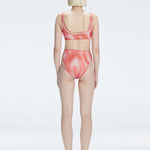 Rosalind Red Optical Scoop Neck 3D Print Bikini Top | Moeva | Bikini Top | Each week unveils new pieces—luxury swimwear, fluid resort silhouettes, and elevated summer-to-evening essentials designed to carry you from coastal escapes to city nights.
