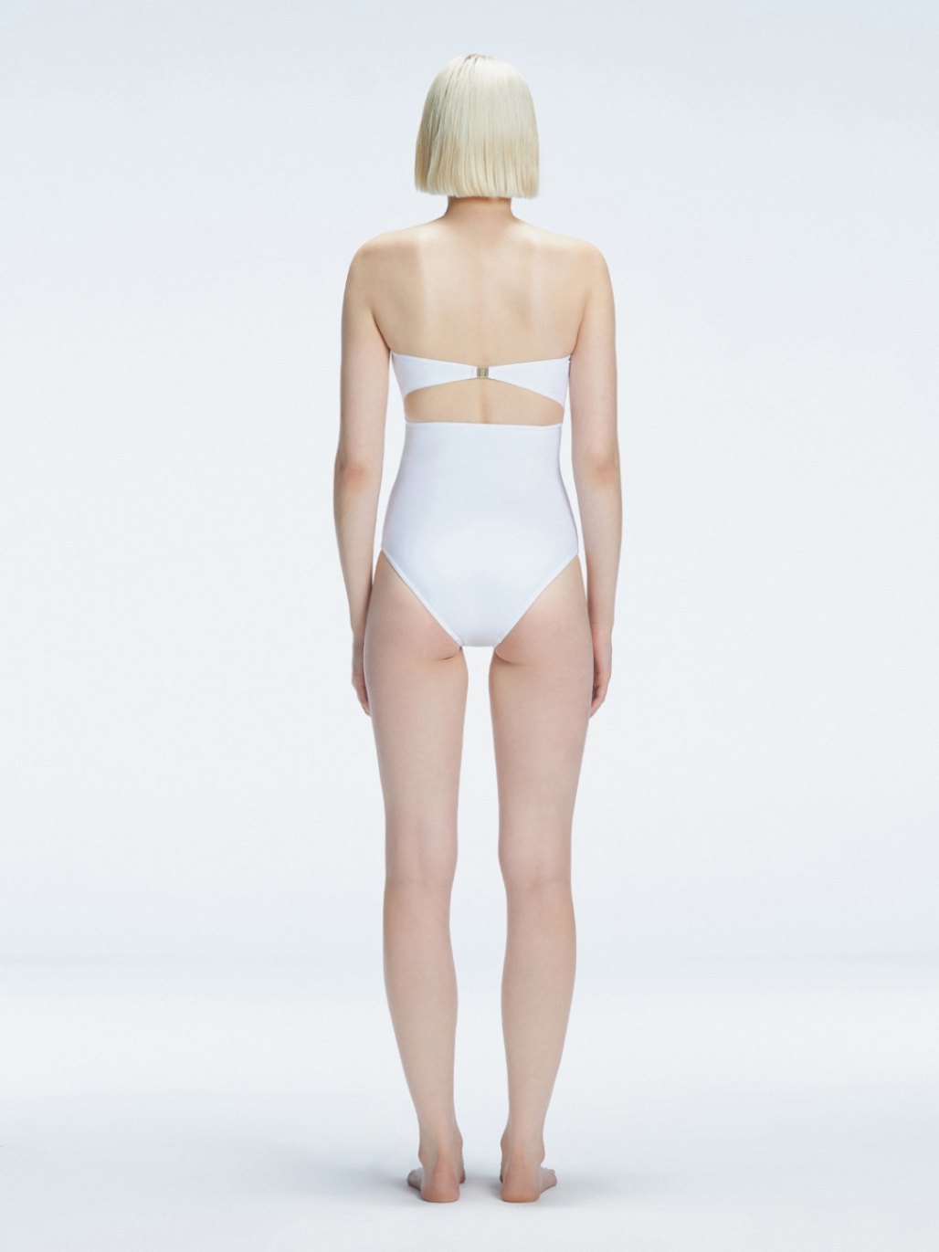 Ursula White Bandeau Swimsuit | Moeva | One-Piece | Each week unveils new pieces—luxury swimwear, fluid resort silhouettes, and elevated summer-to-evening essentials designed to carry you from coastal escapes to city nights.