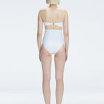 Ursula White Bandeau Swimsuit | Moeva | Swimsuit | Each week unveils new pieces—luxury swimwear, fluid resort silhouettes, and elevated summer-to-evening essentials designed to carry you from coastal escapes to city nights.