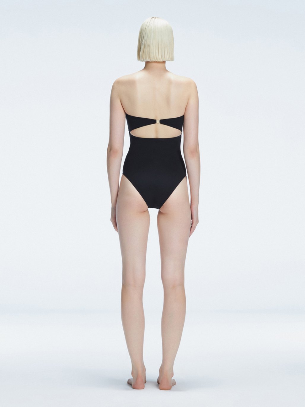 Ursula Black Bandeau Swimsuit | Moeva | One-Piece | Each week unveils new pieces—luxury swimwear, fluid resort silhouettes, and elevated summer-to-evening essentials designed to carry you from coastal escapes to city nights.