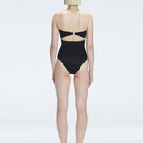 Ursula Black Bandeau Swimsuit | Moeva | One-Piece | Each week unveils new pieces—luxury swimwear, fluid resort silhouettes, and elevated summer-to-evening essentials designed to carry you from coastal escapes to city nights.