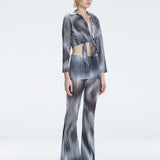 Greta Black Long Sleeve Tie Front Shirt | Moeva | Top | Each week unveils new pieces—luxury swimwear, fluid resort silhouettes, and elevated summer-to-evening essentials designed to carry you from coastal escapes to city nights.
