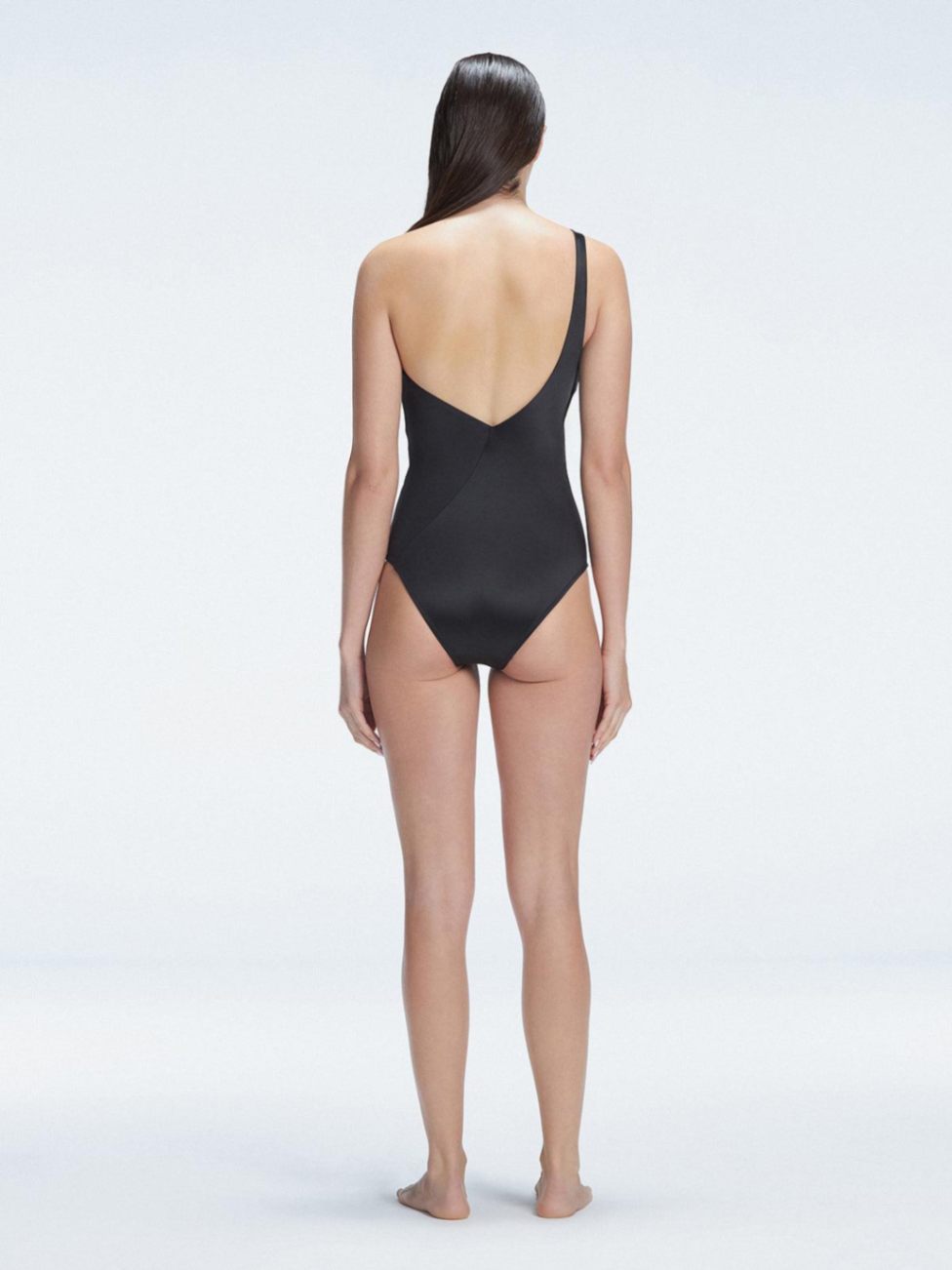 Solene Black One Shoulder Swimsuit | Moeva | One-Piece | Each week unveils new pieces—luxury swimwear, fluid resort silhouettes, and elevated summer-to-evening essentials designed to carry you from coastal escapes to city nights.