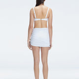 Siena White Mesh Detail Mini Skirt | Moeva | Beachwear Skirts | Each week unveils new pieces—luxury swimwear, fluid resort silhouettes, and elevated summer-to-evening essentials designed to carry you from coastal escapes to city nights.