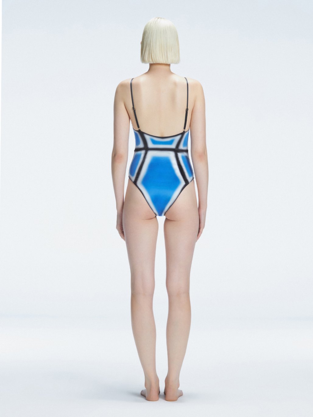 Seraphina Blue Optical Scoop Neck Swimsuit | Moeva | One-Piece | Each week unveils new pieces—luxury swimwear, fluid resort silhouettes, and elevated summer-to-evening essentials designed to carry you from coastal escapes to city nights.