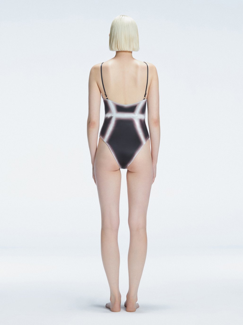 Seraphina Black Optical Scoop Neck Swimsuit | Moeva | One-Piece | Each week unveils new pieces—luxury swimwear, fluid resort silhouettes, and elevated summer-to-evening essentials designed to carry you from coastal escapes to city nights.