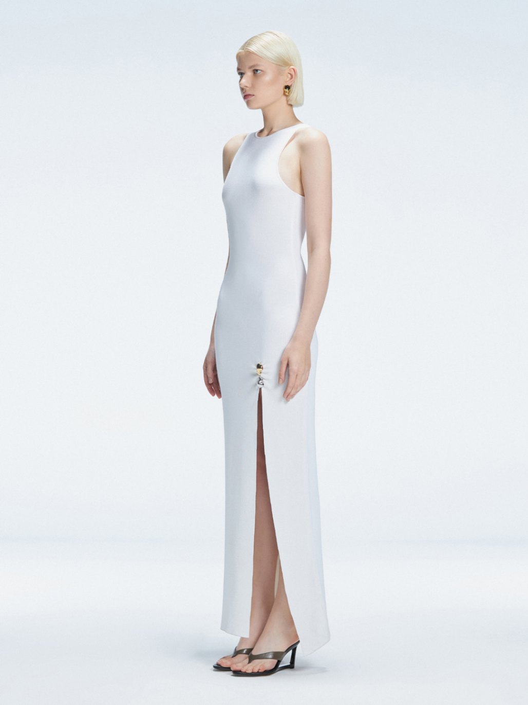 Louisa White Halter Knit Maxi Dress with Slit Detail | Moeva | Dress | Each week unveils new pieces—luxury swimwear, fluid resort silhouettes, and elevated summer-to-evening essentials designed to carry you from coastal escapes to city nights.