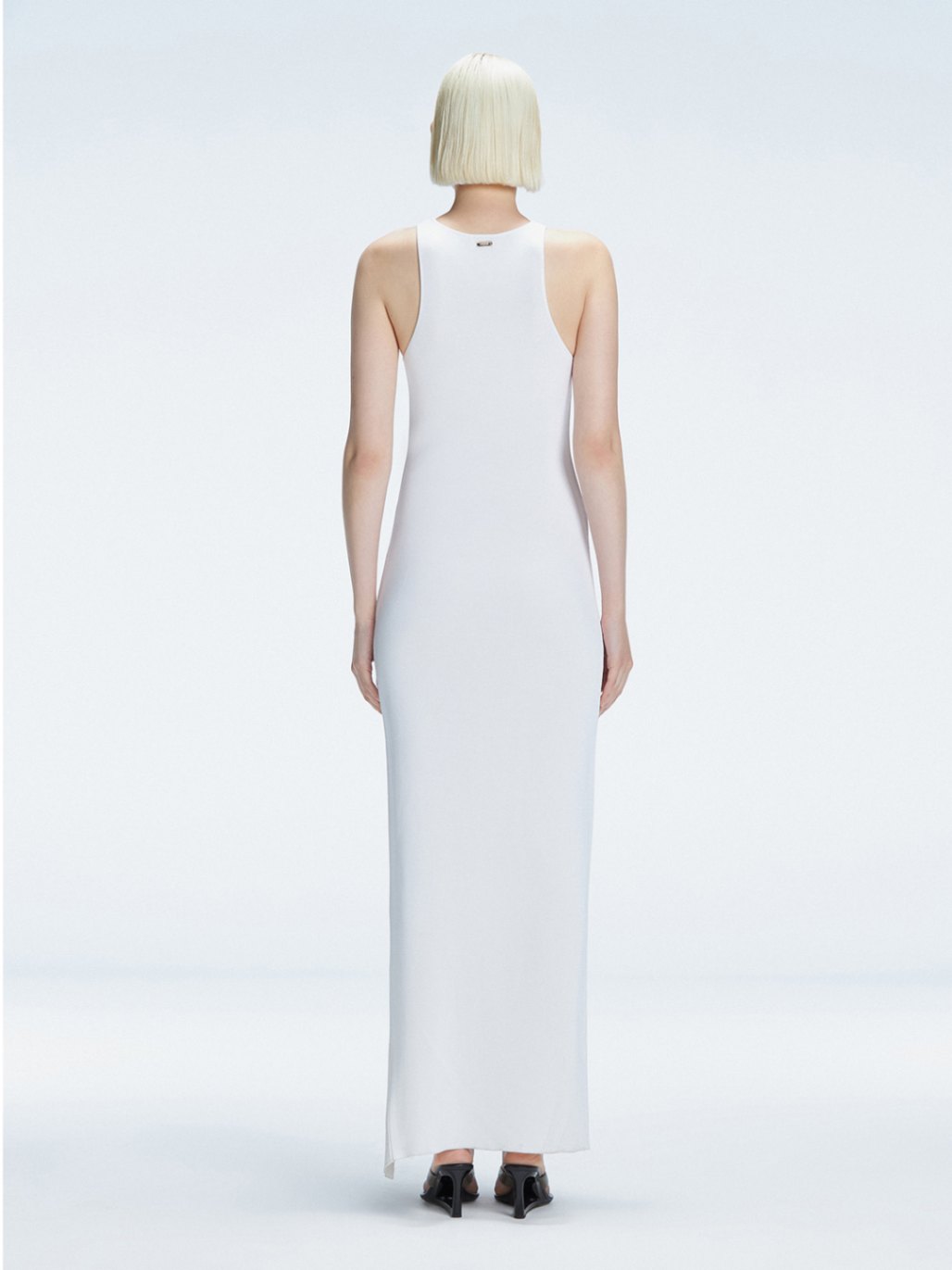 Louisa White Halter Knit Maxi Dress with Slit Detail | Moeva | Dress | Each week unveils new pieces—luxury swimwear, fluid resort silhouettes, and elevated summer-to-evening essentials designed to carry you from coastal escapes to city nights.