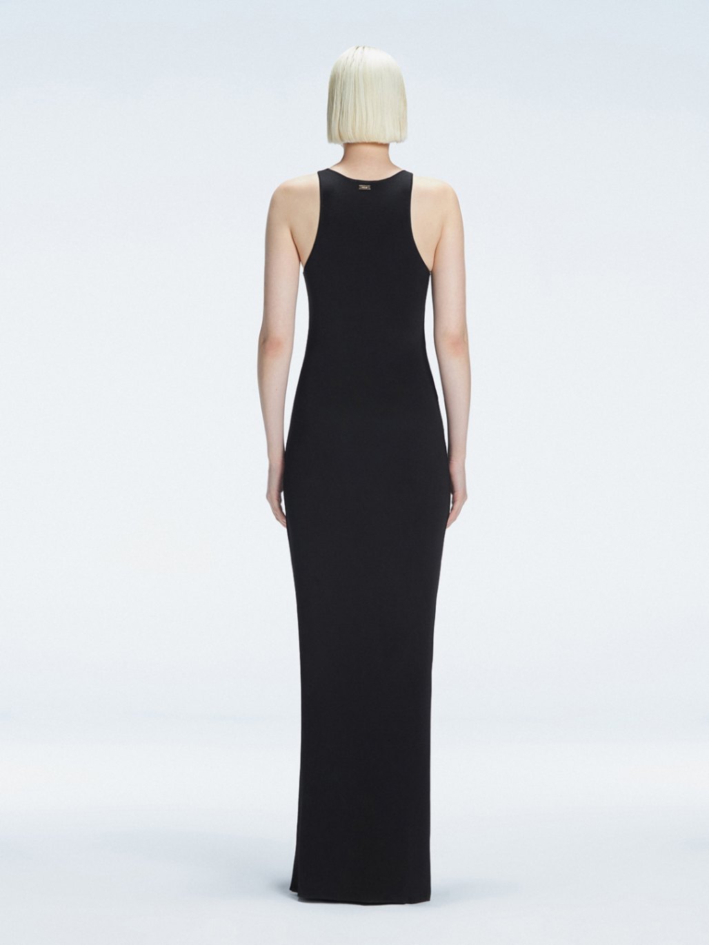 Louisa Black Halter Knit Maxi Dress with Slit Detail | Moeva | Dress | Each week unveils new pieces—luxury swimwear, fluid resort silhouettes, and elevated summer-to-evening essentials designed to carry you from coastal escapes to city nights.