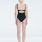 Lyra Black Halter Swimsuit | Moeva | One-Piece | Each week unveils new pieces—luxury swimwear, fluid resort silhouettes, and elevated summer-to-evening essentials designed to carry you from coastal escapes to city nights.