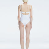 5eleven Mag Editorial - Lyra White Halter Swimsuit | Moeva | One-Piece | Each week unveils new pieces—luxury swimwear, fluid resort silhouettes, and elevated summer-to-evening essentials designed to carry you from coastal escapes to city nights.