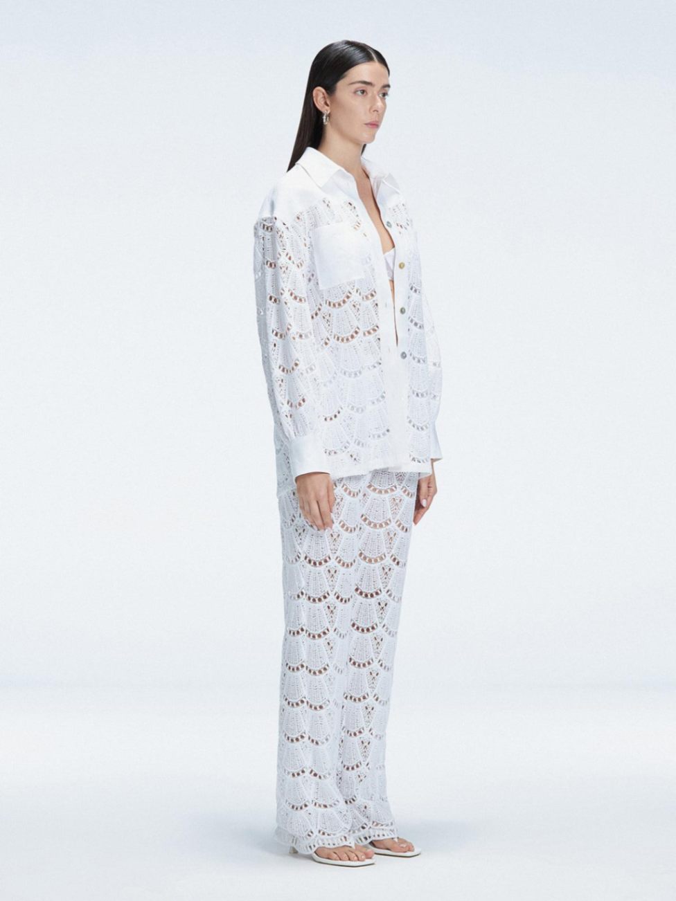 Nola White Crochet Shirt & Elysia White Crochet High-Waist Pants Set | Moeva | Set | Each week unveils new pieces—luxury swimwear, fluid resort silhouettes, and elevated summer-to-evening essentials designed to carry you from coastal escapes to city nights.