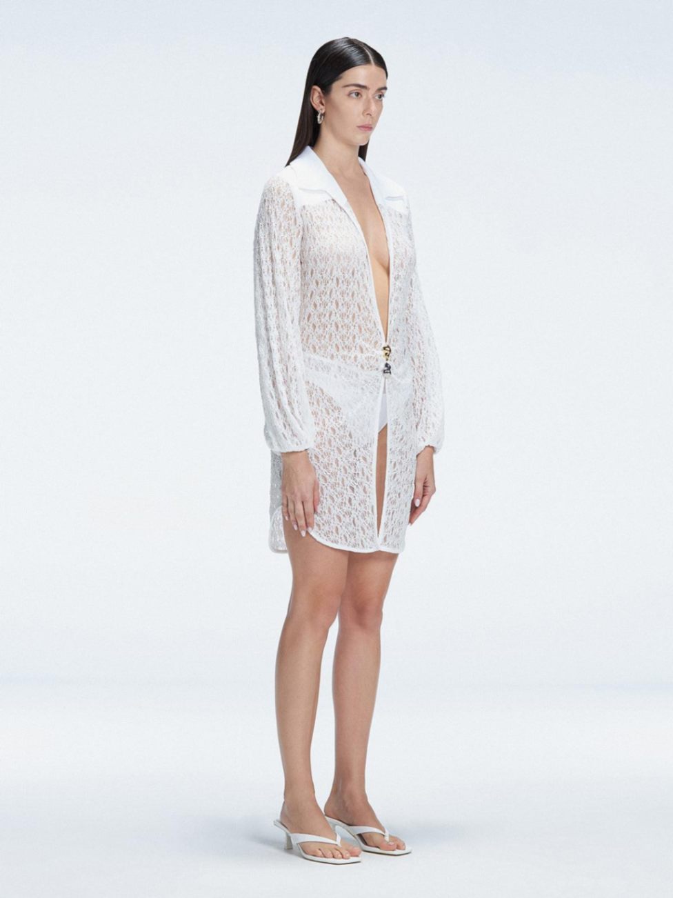 Althea White Long Sleeve Lace Mini Kaftan | Moeva | Beachwear Dresses | Each week unveils new pieces—luxury swimwear, fluid resort silhouettes, and elevated summer-to-evening essentials designed to carry you from coastal escapes to city nights.