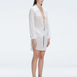Althea White Long Sleeve Lace Mini Kaftan | Moeva | Beachwear Dresses | Each week unveils new pieces—luxury swimwear, fluid resort silhouettes, and elevated summer-to-evening essentials designed to carry you from coastal escapes to city nights.