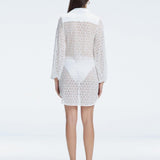 Althea White Long Sleeve Lace Mini Kaftan | Moeva | Beachwear Dresses | Each week unveils new pieces—luxury swimwear, fluid resort silhouettes, and elevated summer-to-evening essentials designed to carry you from coastal escapes to city nights.