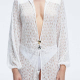 Althea White Long Sleeve Lace Mini Kaftan | Moeva | Beachwear Dresses | Each week unveils new pieces—luxury swimwear, fluid resort silhouettes, and elevated summer-to-evening essentials designed to carry you from coastal escapes to city nights.