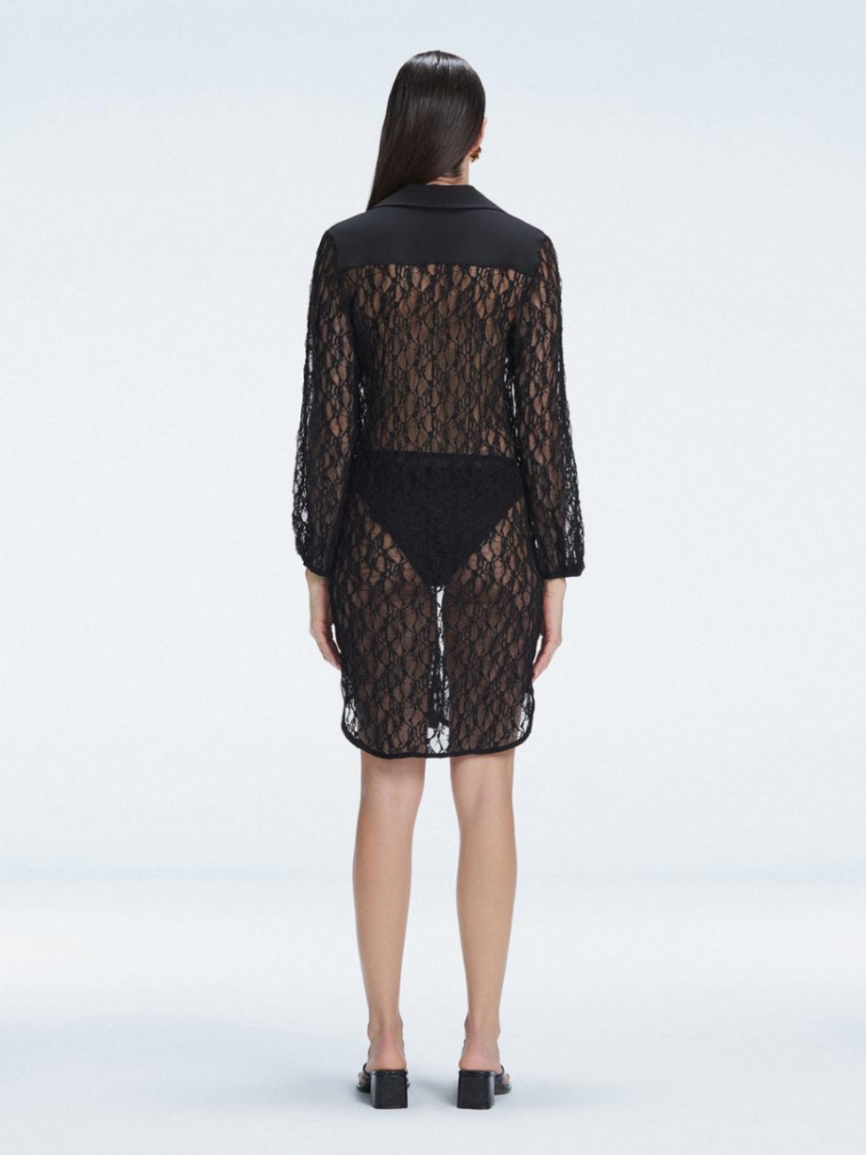 Althea Black Long Sleeve Lace Mini Kaftan | Moeva | Beachwear Dresses | Each week unveils new pieces—luxury swimwear, fluid resort silhouettes, and elevated summer-to-evening essentials designed to carry you from coastal escapes to city nights.