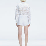 Elise White Linen Mini Skort | Moeva | Skort | Each week unveils new pieces—luxury swimwear, fluid resort silhouettes, and elevated summer-to-evening essentials designed to carry you from coastal escapes to city nights.