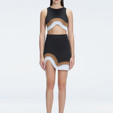 Lydia Black Optical Knit Mini Skirt | Moeva | Skirt | Each week unveils new pieces—luxury swimwear, fluid resort silhouettes, and elevated summer-to-evening essentials designed to carry you from coastal escapes to city nights.