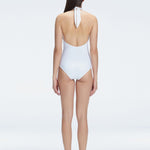 Rosamund White Halter Swimsuit | Moeva | Swimsuit | Each week unveils new pieces—luxury swimwear, fluid resort silhouettes, and elevated summer-to-evening essentials designed to carry you from coastal escapes to city nights.