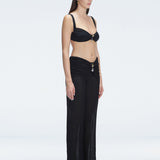 Angelique Black High Waist Beach Pant | Moeva | Women Beachwear Pants | Each week unveils new pieces—luxury swimwear, fluid resort silhouettes, and elevated summer-to-evening essentials designed to carry you from coastal escapes to city nights.