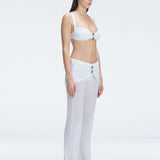 Angelique White High Waist Beach Pant | Moeva | Women Beachwear Pants | Each week unveils new pieces—luxury swimwear, fluid resort silhouettes, and elevated summer-to-evening essentials designed to carry you from coastal escapes to city nights.