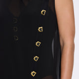 Solianne Black Sheer Sleeveless Asymmetric Dress with Gold Button Detail | Moeva | Dress | Each week unveils new pieces—luxury swimwear, fluid resort silhouettes, and elevated summer-to-evening essentials designed to carry you from coastal escapes to city nights.
