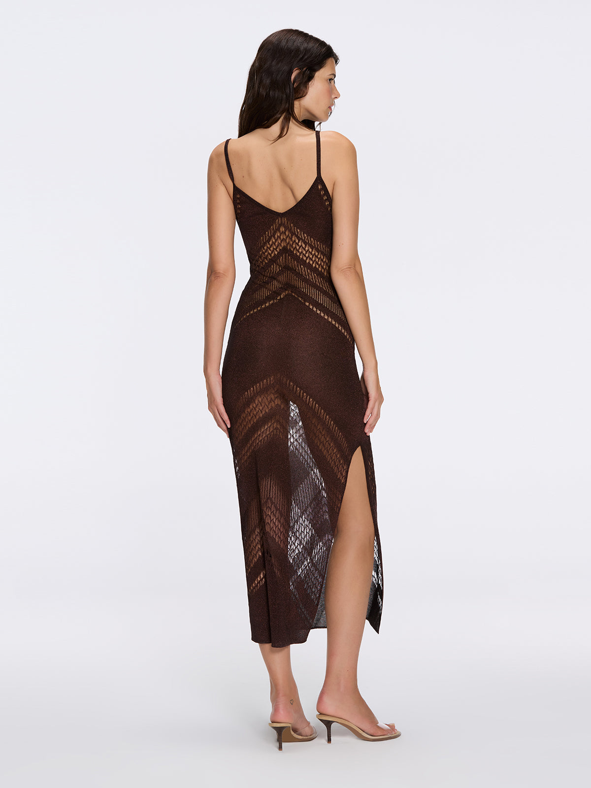Beaulieu Brown Metallic Knit Maxi Dress with V-Neckline and Side Slit | Moeva | Dress | Each week unveils new pieces—luxury swimwear, fluid resort silhouettes, and elevated summer-to-evening essentials designed to carry you from coastal escapes to city nights.