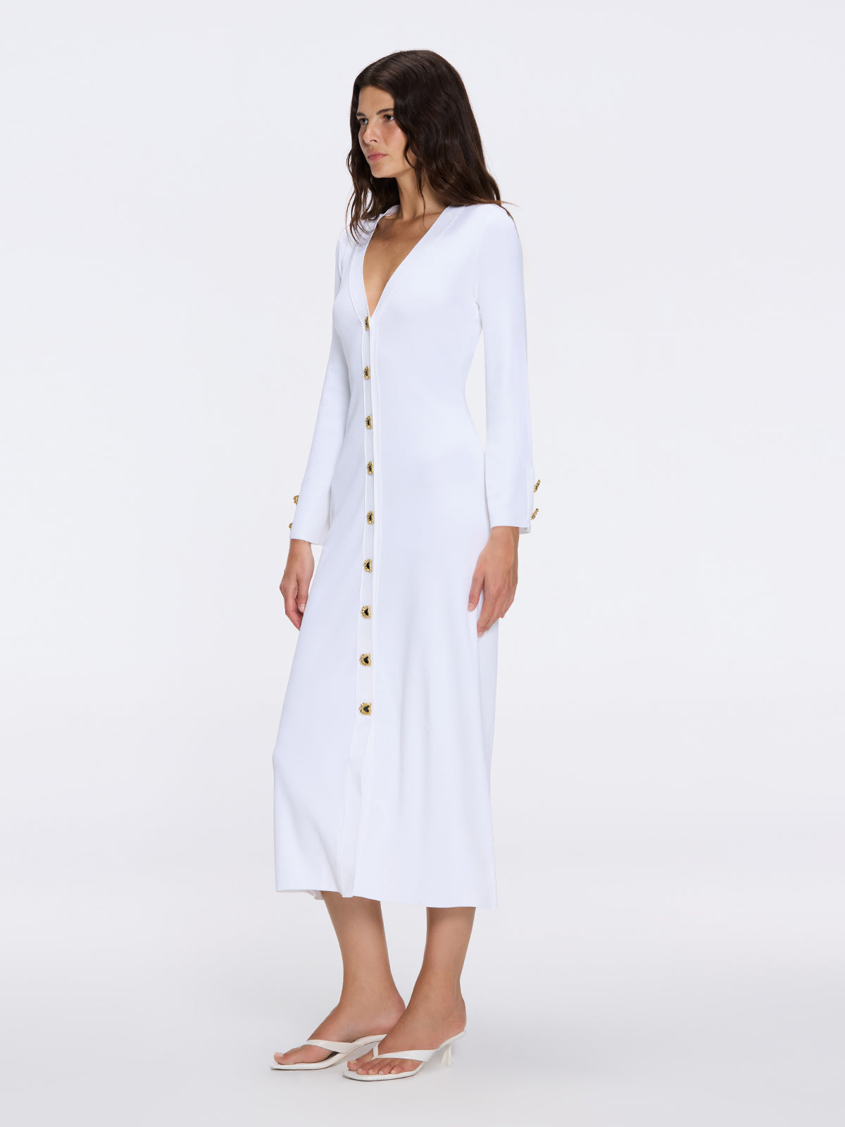 Brezia White Knitted Maxi Dress with Long Sleeves and Gold Button Details | Moeva | Dress | Each week unveils new pieces—luxury swimwear, fluid resort silhouettes, and elevated summer-to-evening essentials designed to carry you from coastal escapes to city nights.