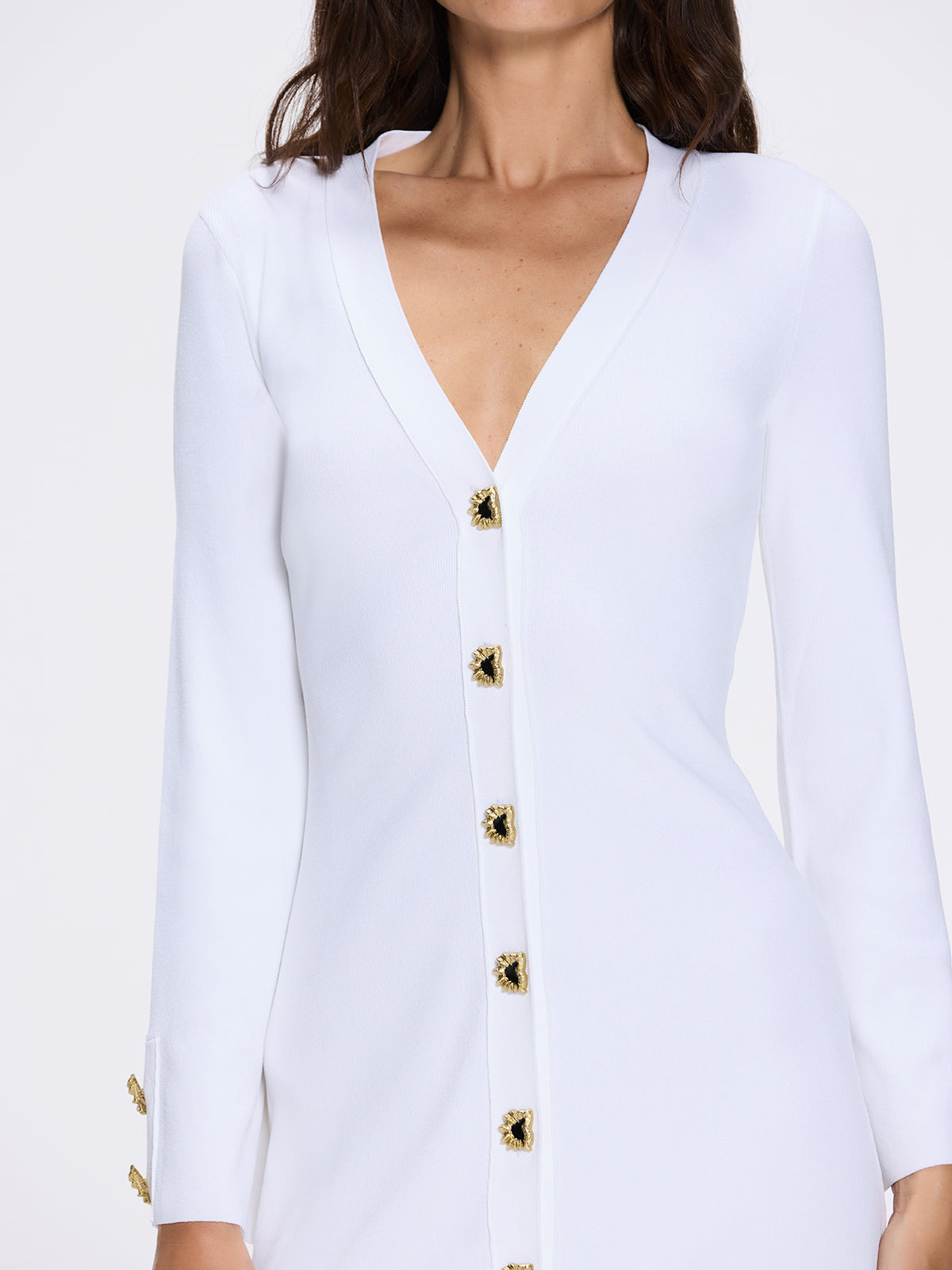 Brezia White Knitted Maxi Dress with Long Sleeves and Gold Button Details | Moeva | Dress | Each week unveils new pieces—luxury swimwear, fluid resort silhouettes, and elevated summer-to-evening essentials designed to carry you from coastal escapes to city nights.