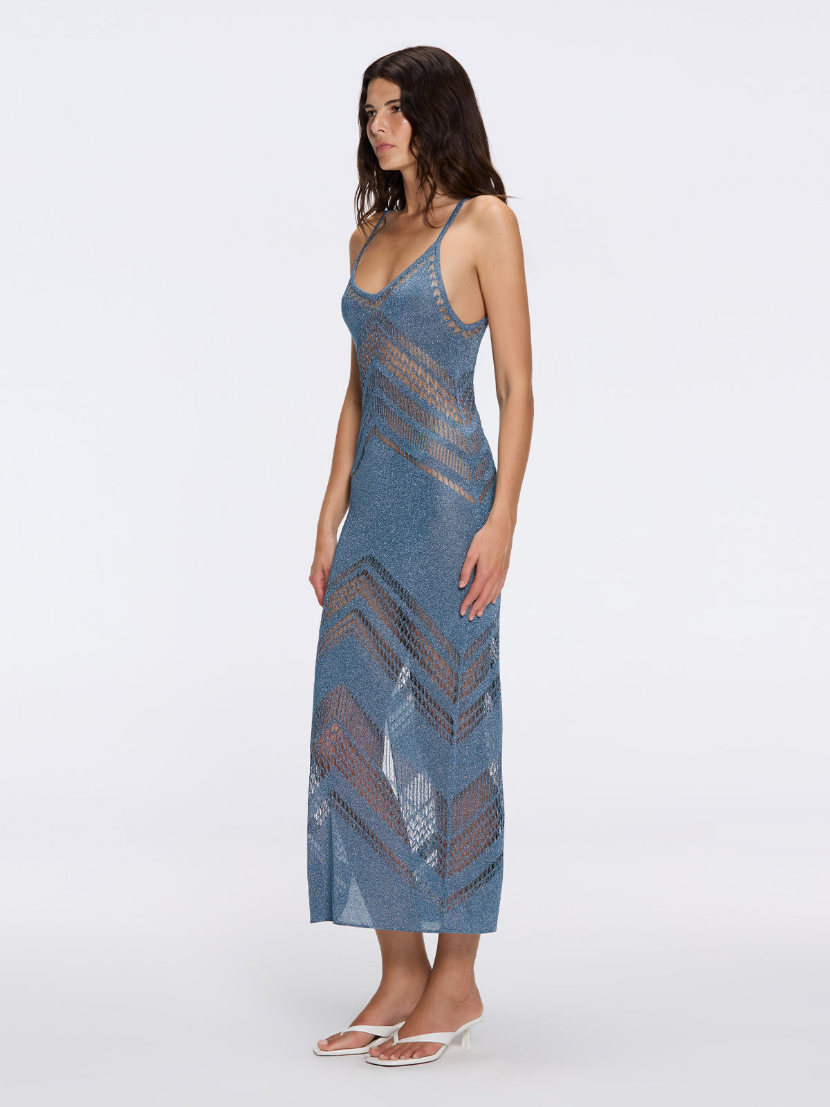 Beaulieu Blue Metallic Knit Maxi Dress with V-Neckline and Side Slit | Moeva | Dress | Each week unveils new pieces—luxury swimwear, fluid resort silhouettes, and elevated summer-to-evening essentials designed to carry you from coastal escapes to city nights.